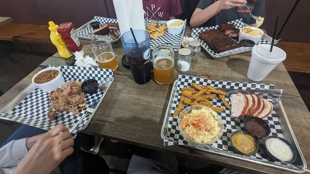 Ribs Pulled Pork Chicken Potato Salad Fried Pickles Mac N Cheese Beans